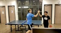 The players exchanging high five after final match in the singles in the Table Tennis Competition, demonstrating sportsmanship